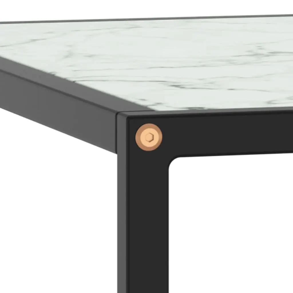 Détail table basse Orlune avec plateau effet marbre blanc et structure noire moderne