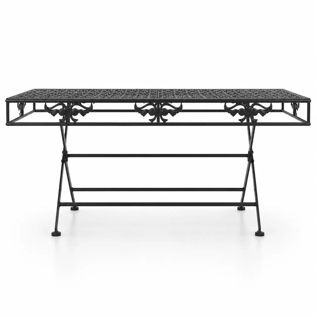 Table basse pliante vintage Rustora en métal noir avec plateau ajouré et structure élégante minimaliste
