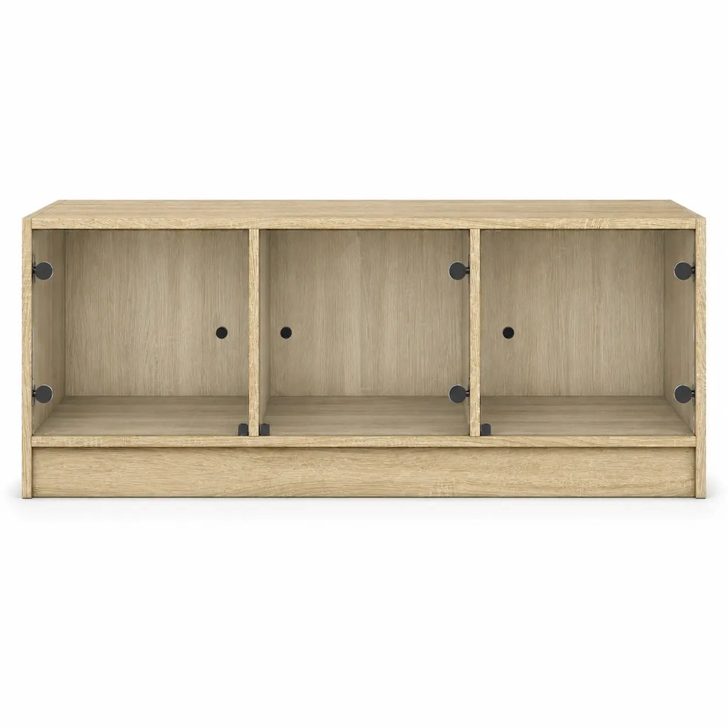 Table basse rectangulaire en bois clair avec trois compartiments de rangement ouverts et panneaux en verre coulissants
