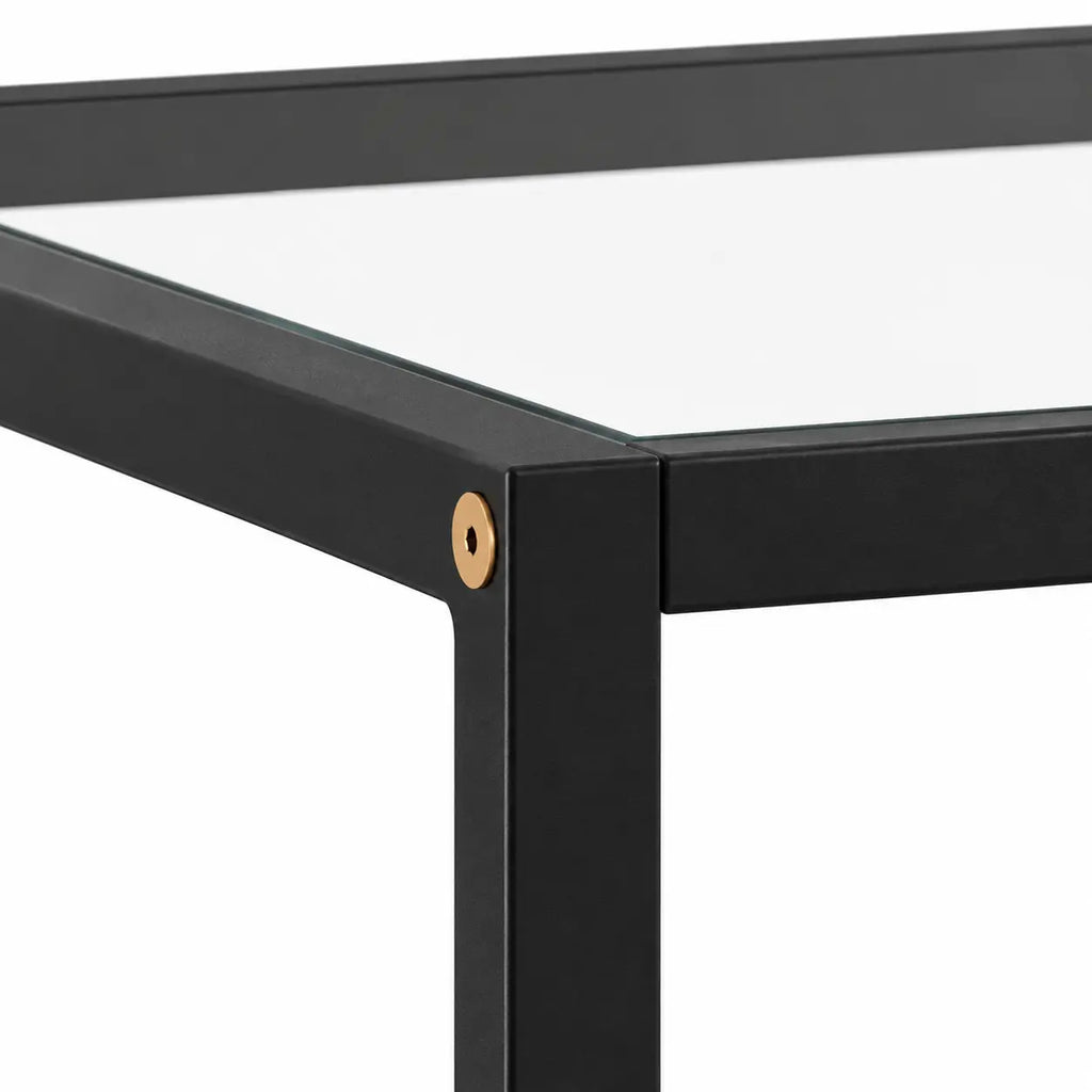 Détail table basse Rectra avec structure noire en métal et plateau en verre transparent moderne