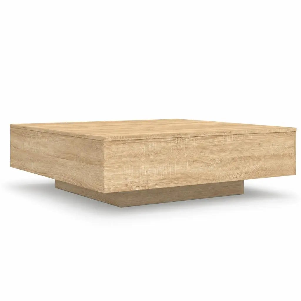 Table basse carrée en bois clair avec design minimaliste et base centrale moderne pour salon contemporain