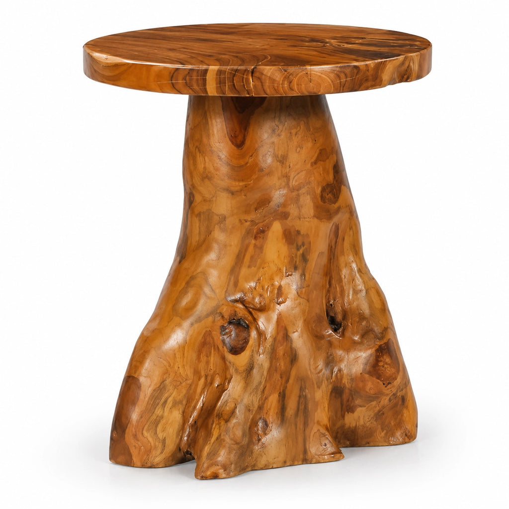 Table basse ronde en bois massif avec plateau poli et base sculptée effet tronc d’arbre, au style naturel organique